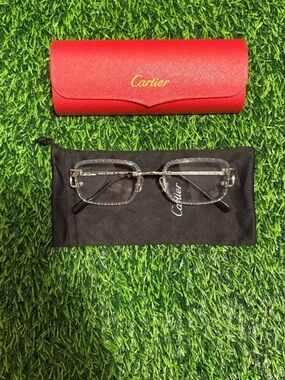 Cartier Clear Rimless Eyeglasses with Silver Metal Frame and Red Case